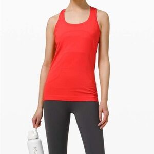 Lululemon racer back tank top. In ‘pink punch’. Size 4. With tags.